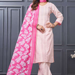Front profile view of a model in a pink cotton ethnic kurta set displaying the straight-cut pants silhouette and the beautiful pattern of the draped matching dupatta