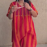 It is the Video of plus-size women who are wearing a pintuck embroidery dress 