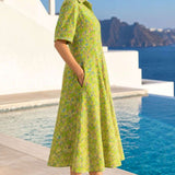 Side profile view of a light green pure cotton frock-style kurti highlighting the practical side pocket and A-line flare.