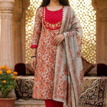 Front full length view of a model showcasing the red pashmina silk printed kurta set variant designed without circle motifs, highlighting an all-over traditional print with matching pants.