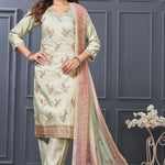 Front full-length view of a model showcasing the mint green silk 3-piece variant, featuring delicate gold embroidery details on the neckline, paired with straight trousers and a matching green scalloped border dupatta.