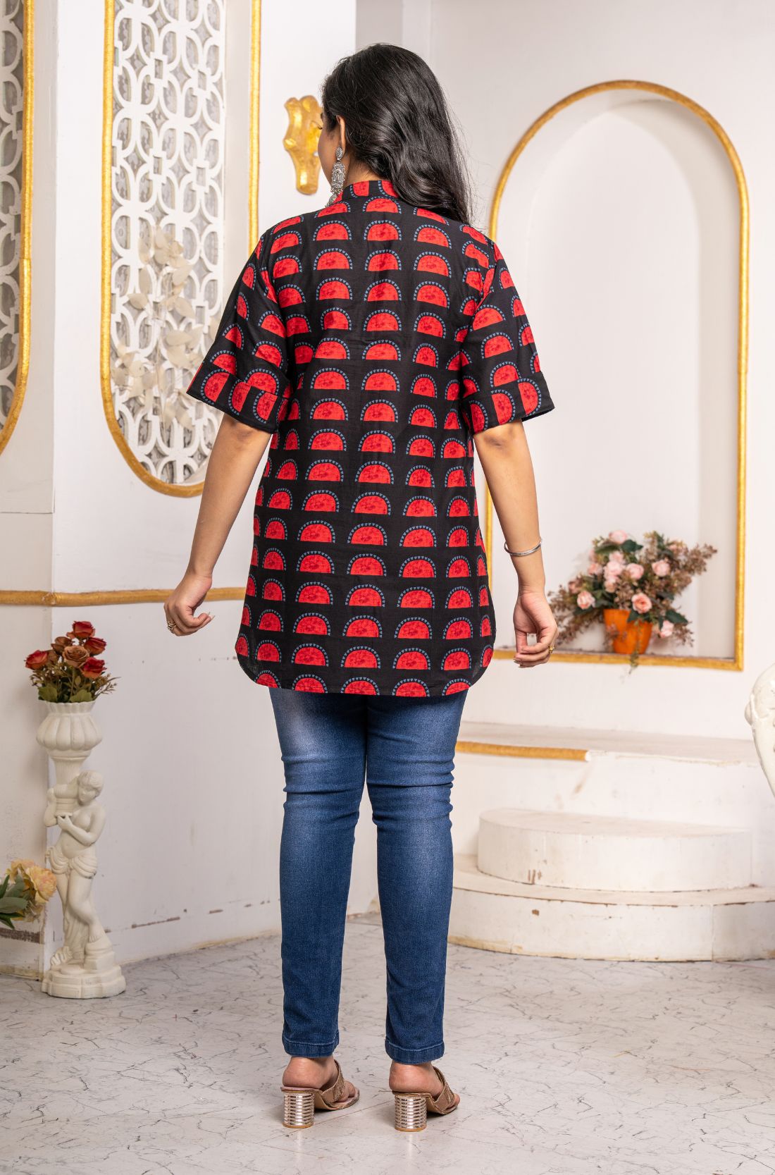 Back view of Women's Geometric Hand Block Print Pure Cotton Shirt Style Kurti displaying all-over handcrafted geometric block print and relaxed hip-covering fit.