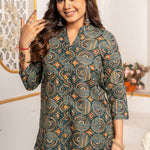 Close-up of Women's Geometric Hand Block Print Pure Cotton Shirt Style Kurti in forest green and rust orange showcasing handcrafted geometric print, stand collar, and wooden buttons.