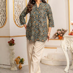 Women's Geometric Hand Block Print Pure Cotton Shirt Style Kurti in forest green and rust orange featuring a stand collar, wooden button placket, 3/4 sleeves, and a relaxed hip-covering silhouette paired with linen trousers.
