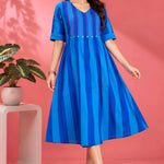 Front angle view showcasing the flared hem and striped pattern of the Philippine Blue handloom cotton tunic frock for casual and work wear.
