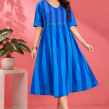 Front angle view showcasing the flared hem and striped pattern of the Philippine Blue handloom cotton tunic frock for casual and work wear.