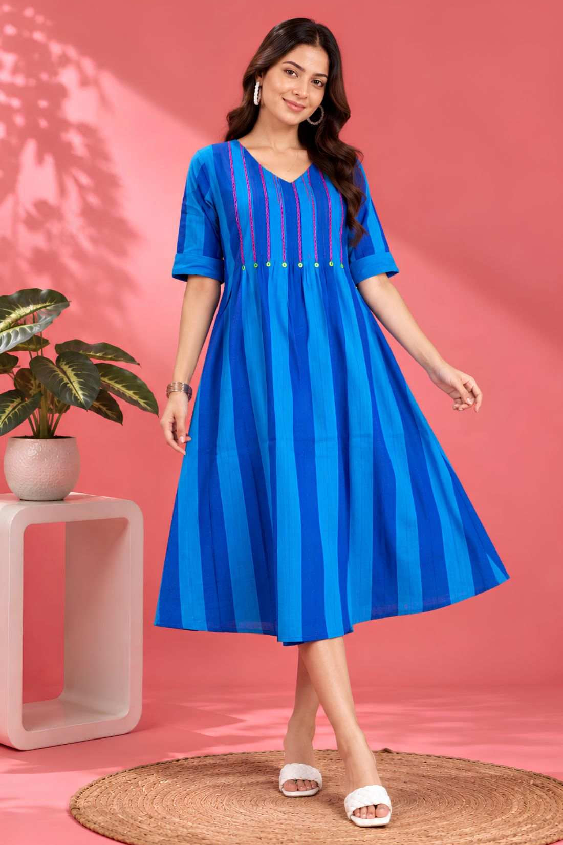 Front angle view showcasing the flared hem and striped pattern of the Philippine Blue handloom cotton tunic frock for casual and work wear.
