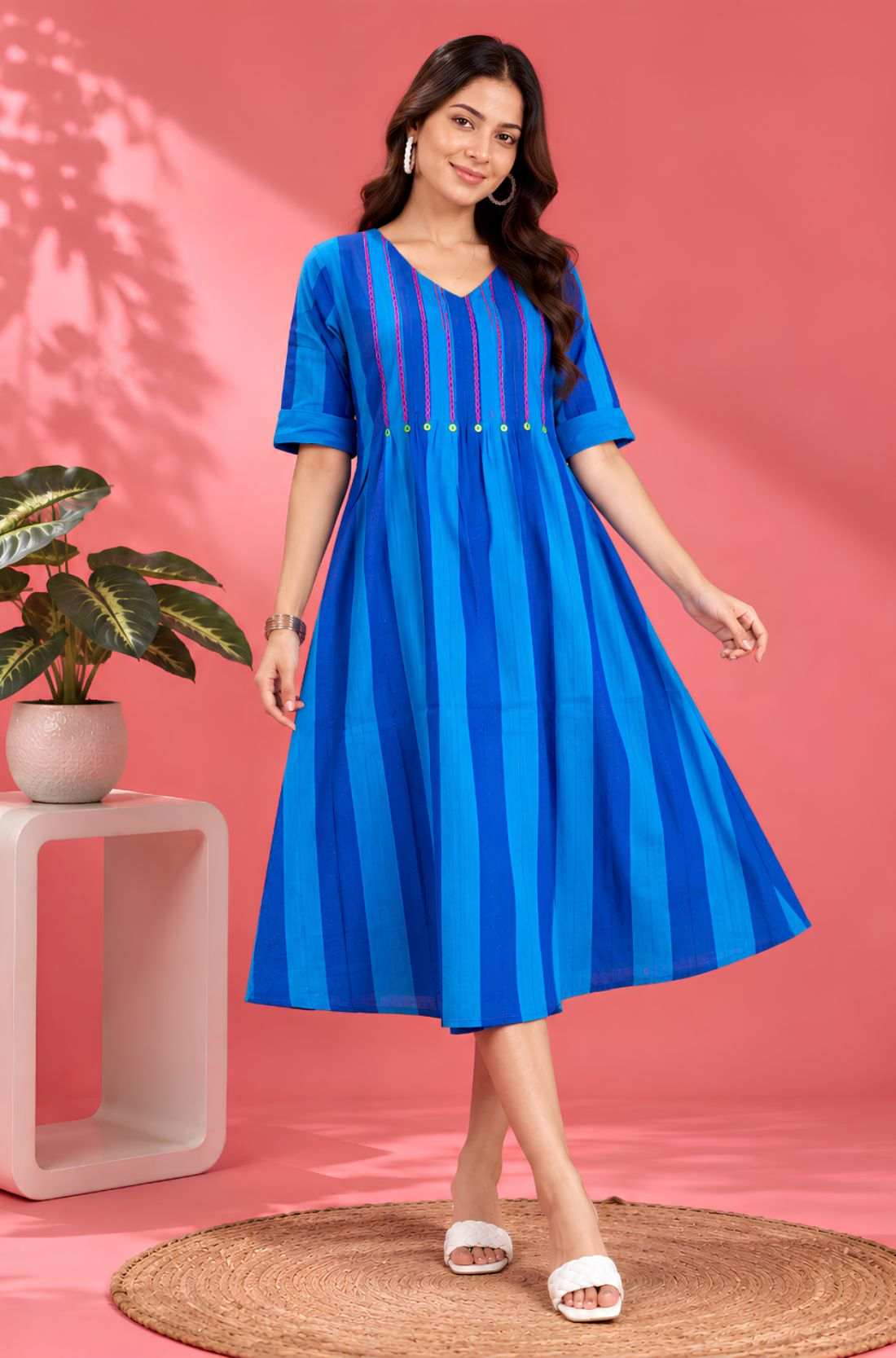 Front angle view showcasing the flared hem and striped pattern of the Philippine Blue handloom cotton tunic frock for casual and work wear.