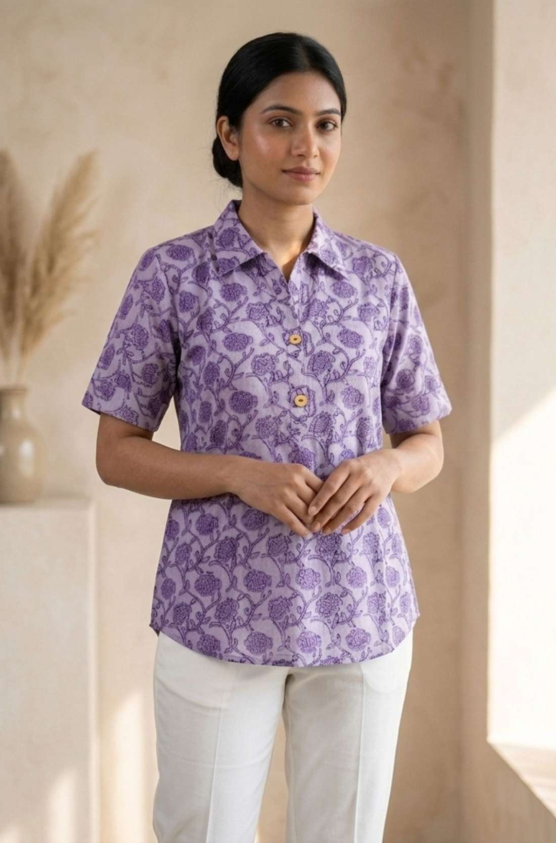 Front view of a women's lavender floral hand block print cotton shirt with relaxed fit and short sleeves.