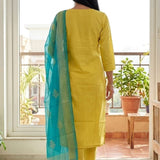 Back view of the straight fit yellow cotton embroidered kurta showing the fit and the printed dupatta drop