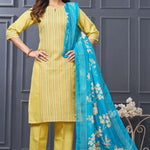 Profile view of a model in a yellow cotton ethnic kurta set displaying the straight-cut pants silhouette and the beautiful pattern of the draped matching dupatta
