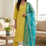 Front full length view of a model in a yellow pure cotton kurta set featuring pink thread embroidery lines, paired with straight pants and a matching printed dupatta